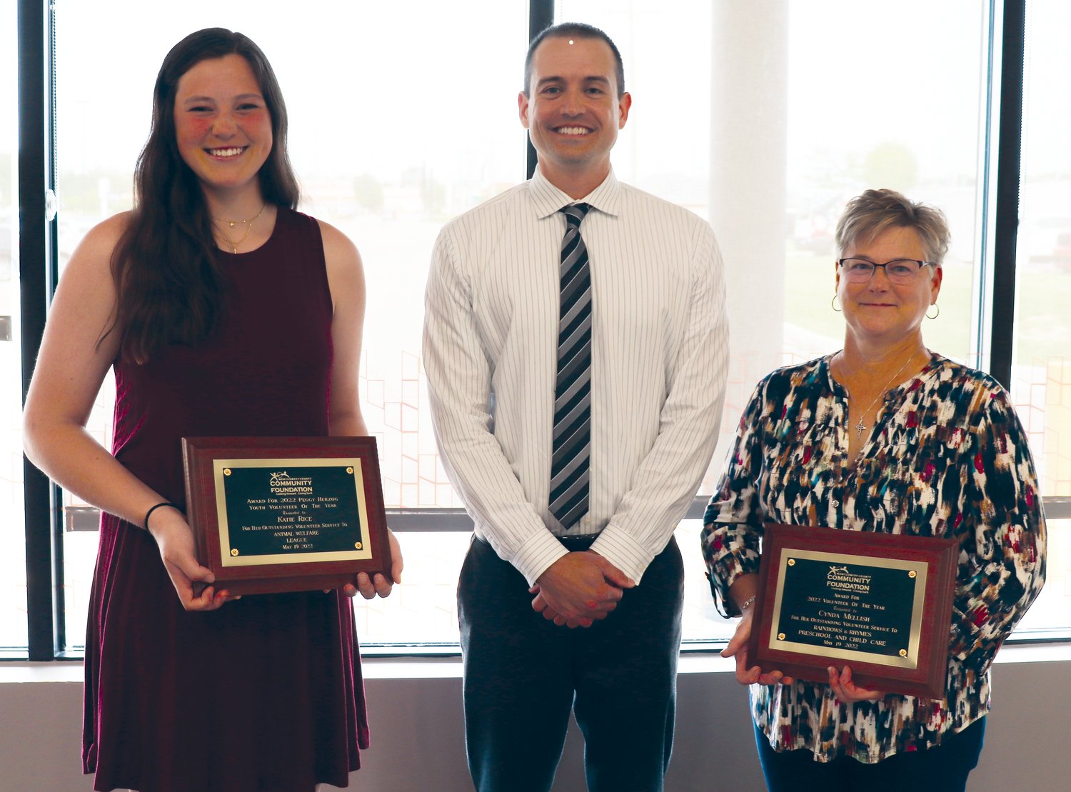 Torey Rauch, center, outgoing Montgomery County Community Foundation board president, poses with Cynda Mellish, the 2022 MCCF Volunteer of the Year, right, and Katie Rice, the 2022 Peggy Herzog Youth Volunteer of the Year.